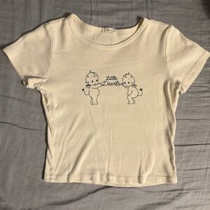 Brandy Melville Cream Graphic Tee with Little Devils Design